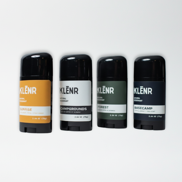 Four deodorant sticks from the brand Klenr on a light gray background