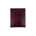 Folded maroon fabric on a white background