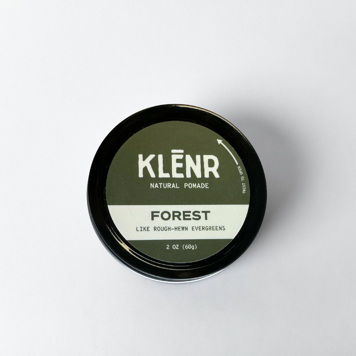 Klénr natural pomade container labeled 'Forest' on a white background