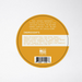 Round yellow label with text and a barcode on a white background