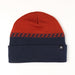 Two-tone beanie with red top and navy bottom on a white background