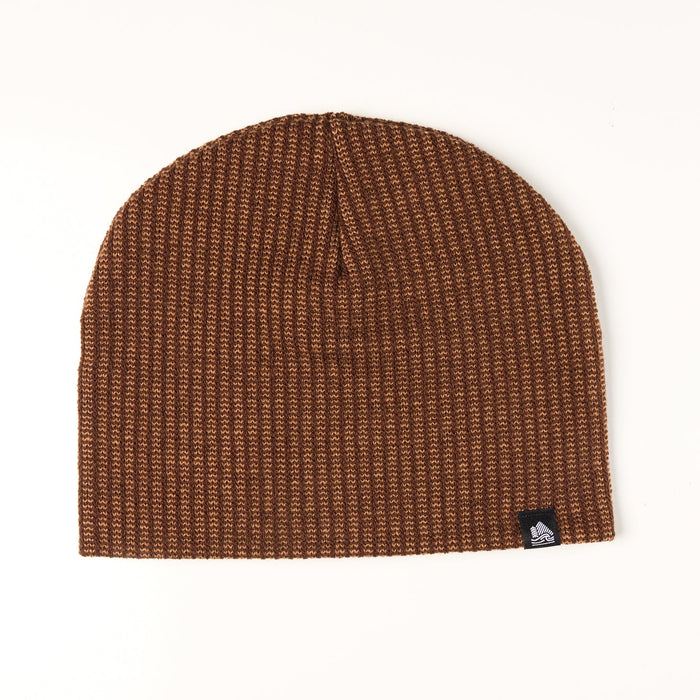 Brown knit beanie with a logo tag on a white background
