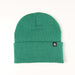 Green beanie with a brand logo on a white background