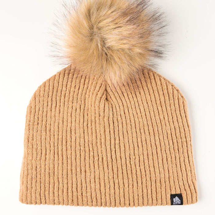 Beige knit beanie with a fur pom-pom on a white background
