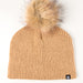 Beige knit beanie with a fur pom-pom on a white background