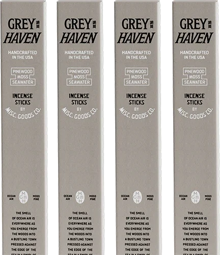 Four packages of Grey Haven incense sticks on a white background