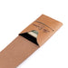 Brown leather money clip with brand name on a white background