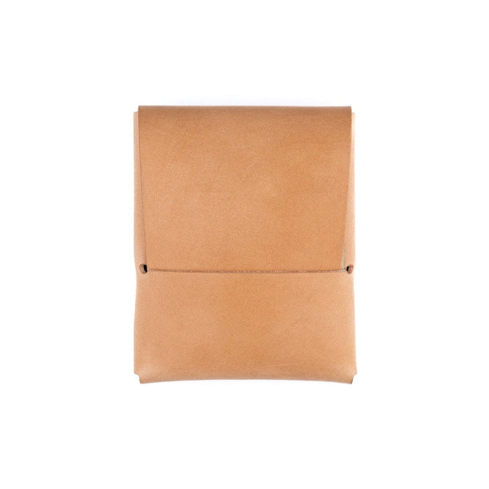 Tan leather wallet on a white background