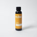 Bottle of KLéNR natural beard oil with a yellow label on a white background
