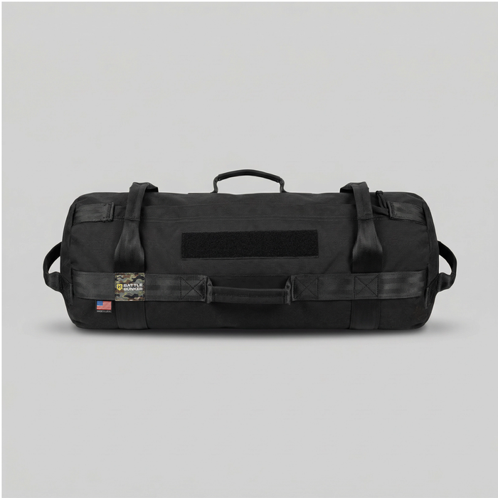 Black tactical duffel bag on a light gray background