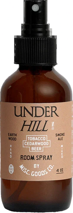Brown room spray bottle with black sprayer labeled 'Under Hill' on a white background