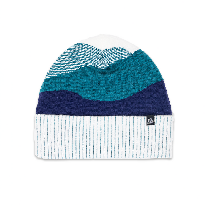 Color-blocked beanie with blue, green, and white sections on a white background